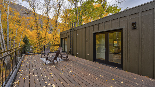 A huge sun deck opens completes the third level master suite, though it is accessible at the top of the inside stair without going through it. Great place for morning coffee or afternoon drinks.