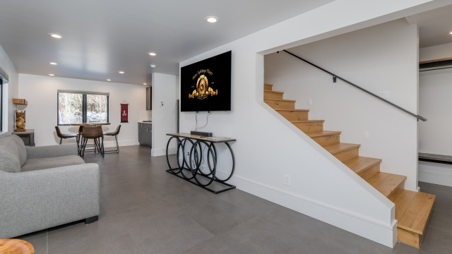 Up/down blinds in the lower level Family room add privacy options, but you're mostly surrounded by wooded surroundings anyway.
