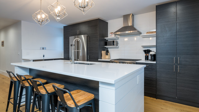 The Kitchen's center island also provides causal countertop dinning with stools for four.
