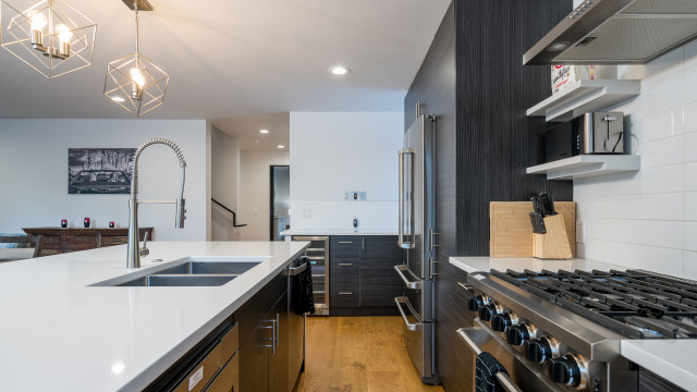 The fully equipped gourmet kitchen boasts a five burner gas range/oven, a luxury Thor Refrigerator, Wine Fridge, under counter Microwave, Dishwasher, and Nespresso Coffee Maker (pods not included).