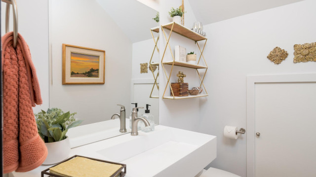 The well appointed Half Bathroom is located directly off the Living Room.