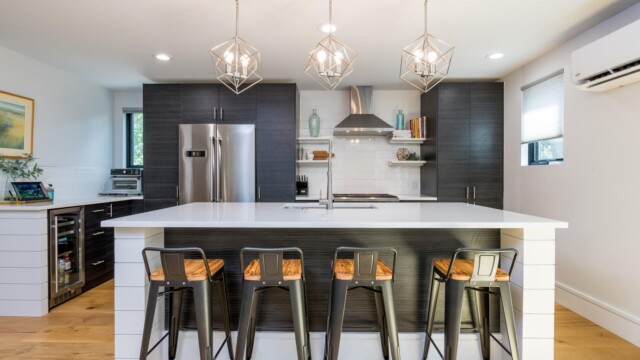 The Kitchen's center island also provides causal countertop dinning with stools for four.
