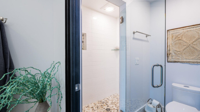 The Second Bathroom is ensuite to the Second Bedroom and has a double sink vanity and a large walk in shower.