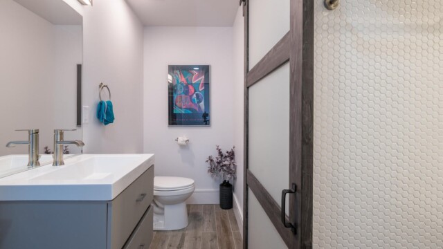 The second Half Bathroom is located off the Lower Level Family Room.